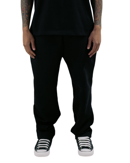 ARMOROFGOD Midnight Heavyweight Bottoms black — model front view, 600GSM oversized faith-driven streetwear jogger