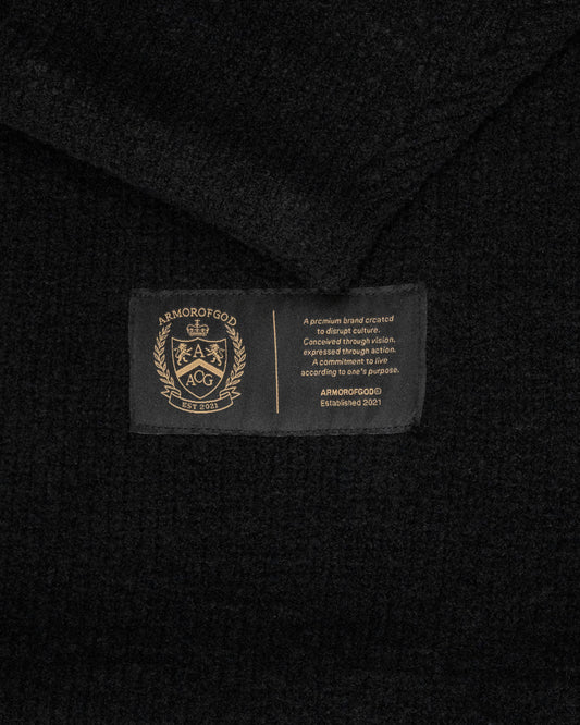 ARMOROFGOD Lineage Knit black — side view showing oversized fit