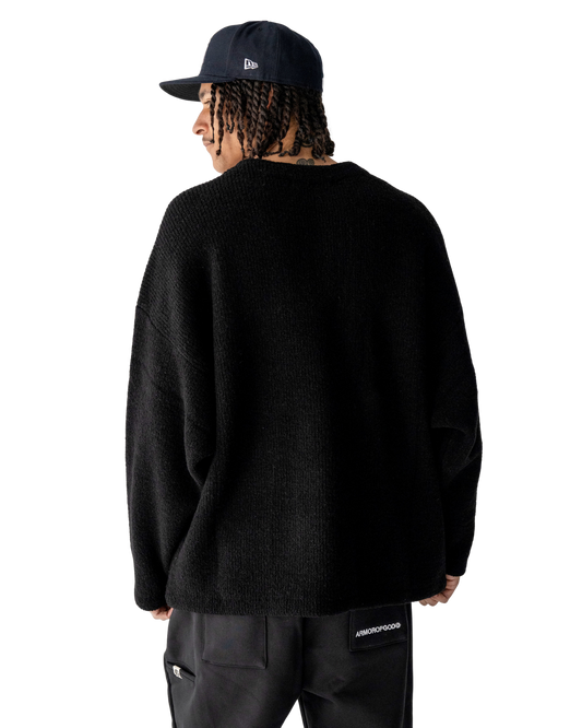 ARMOROFGOD Lineage Knit black — embroidered chest logo close-up